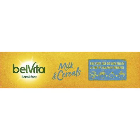 A family breakfast table featuring BelVita Milk & Cereals Breakfast Biscuits with a glass of milk and fresh fruit
